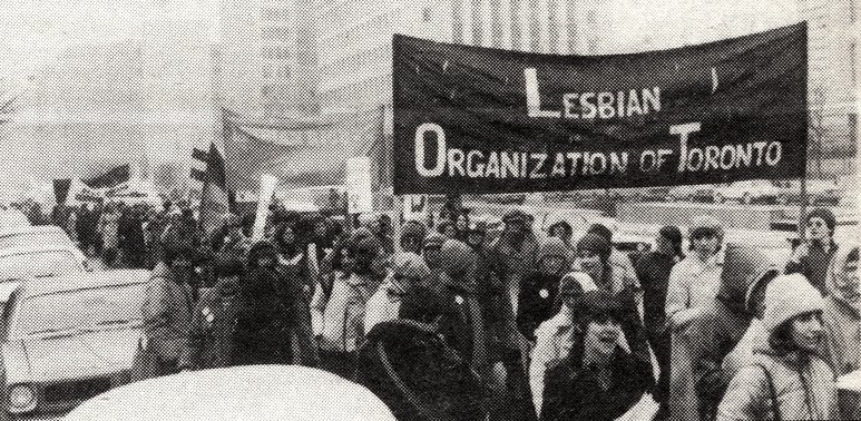Loot marchers on College Street Toronto. Image courtesy of the Canadian Lesbian and Gay Archives
